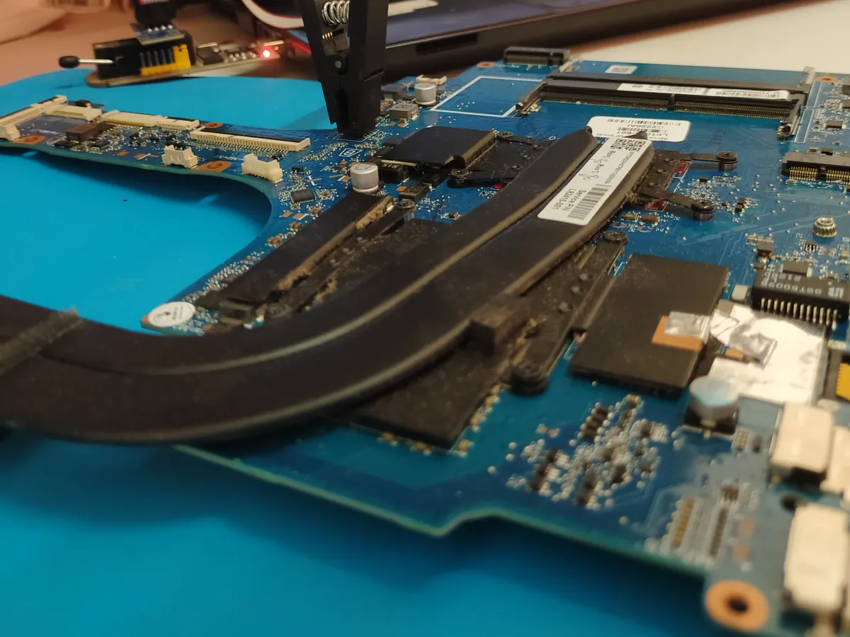 Chip-level diagnosis on a laptop motherboard with a test probe