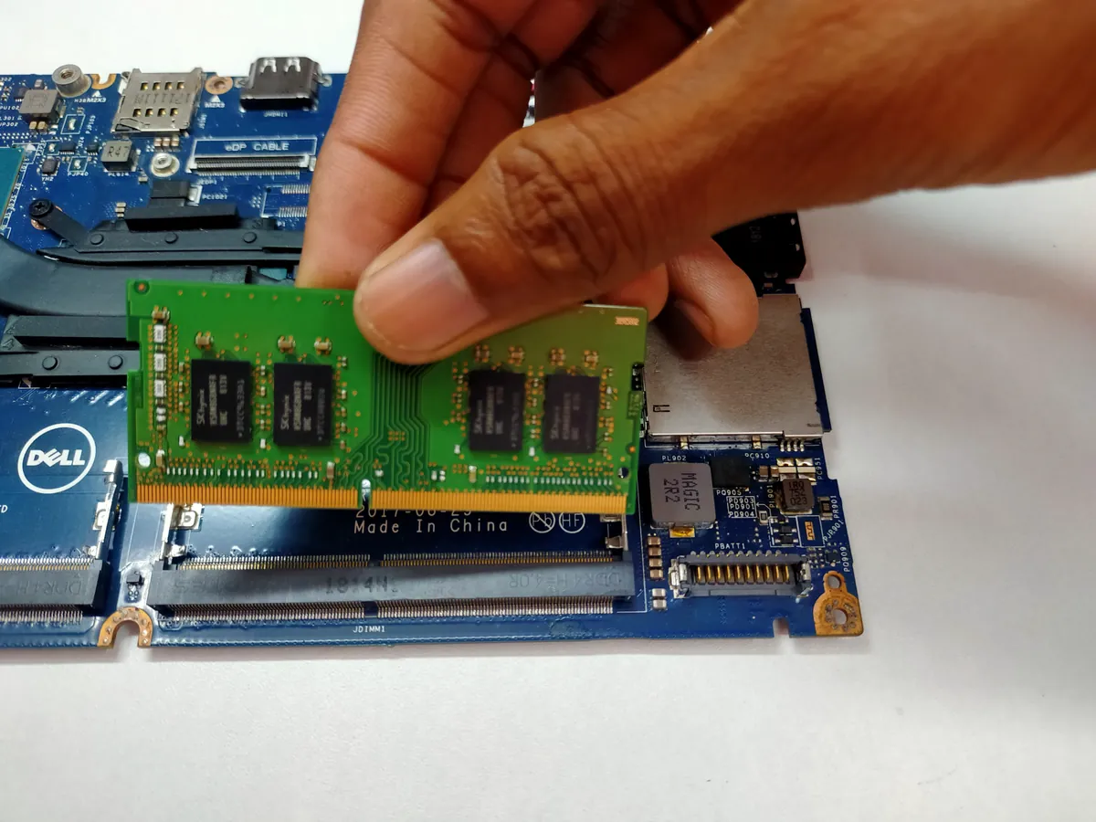 Laptop RAM upgrade being fitted by a LAPTOP MASTER technician