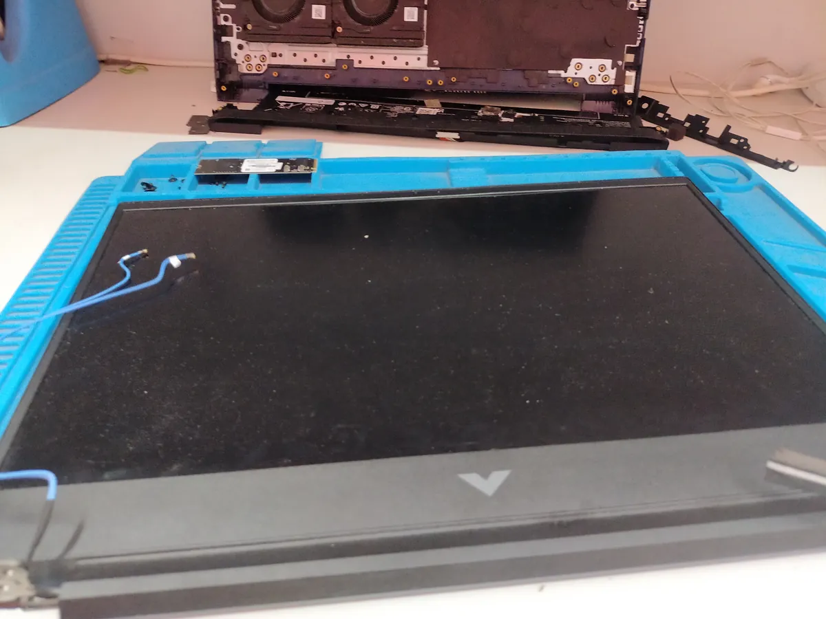 Laptop display panel removed for screen replacement service